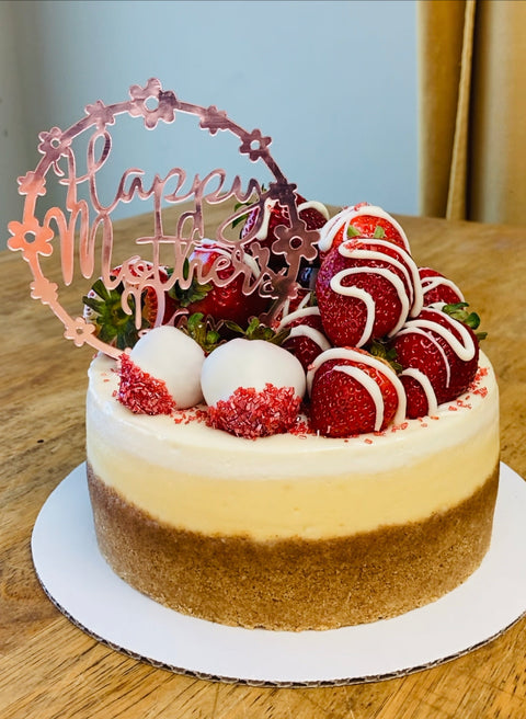Sstarwberry topped classic cheesecake for mother's day