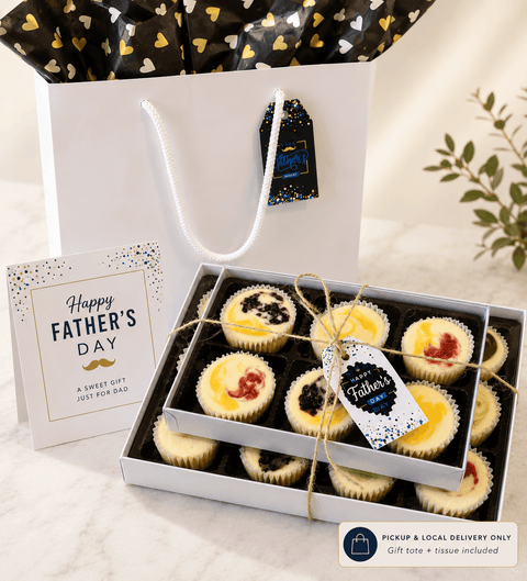 Box of mini cheesecakes with a 'Happy Father's Day' card and gift tote.