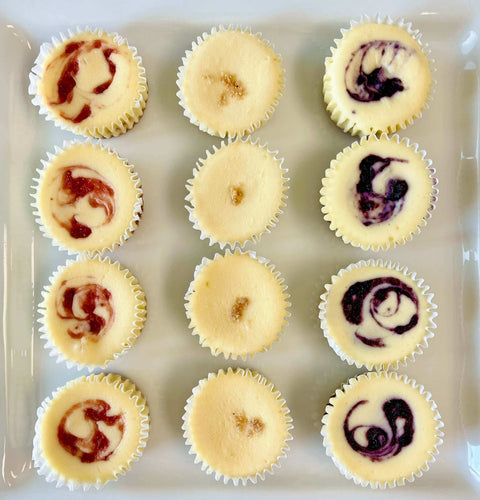 1 dozen Berry and Original Cheesecake minis on a white plate