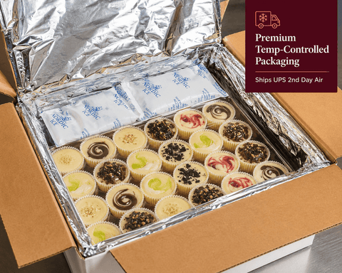 Open box containing mini cheesecakes with a label for premium temp-controlled packaging.
